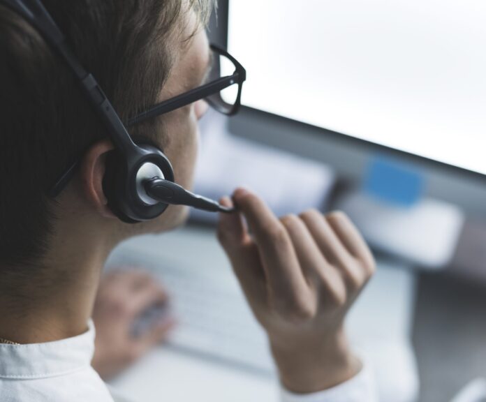 Remote,Worker,Connecting,Online,And,Wearing,A,Headset,,Technology,And